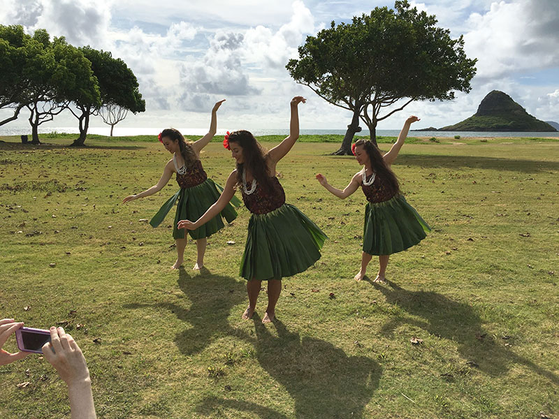 Hawaiian dancers perform on location.