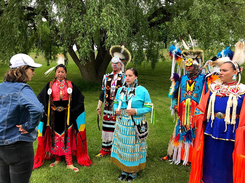 Native American dancers prepare to perform for the film Dancing Joy.