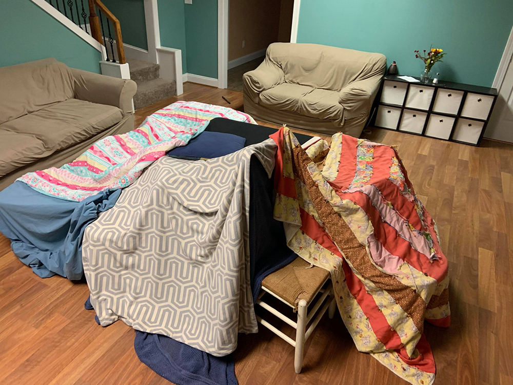 Jessica's kids build a blanket fort to ward off winter blues! 