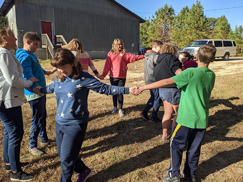 Jessica's children enjoy playing group games at their homeschool co-op! 