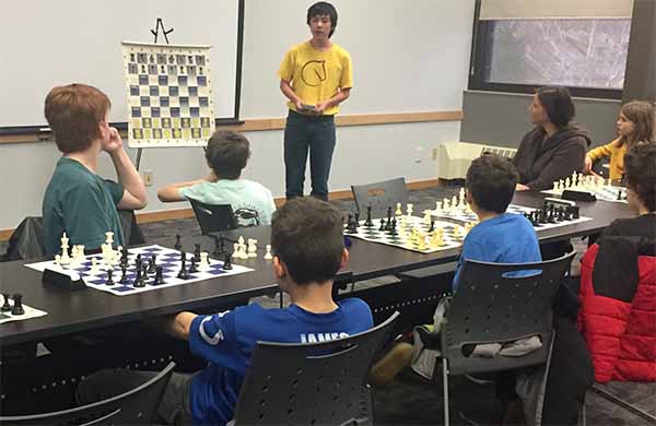 Brogan McGrath teaches advanced chess strategies.