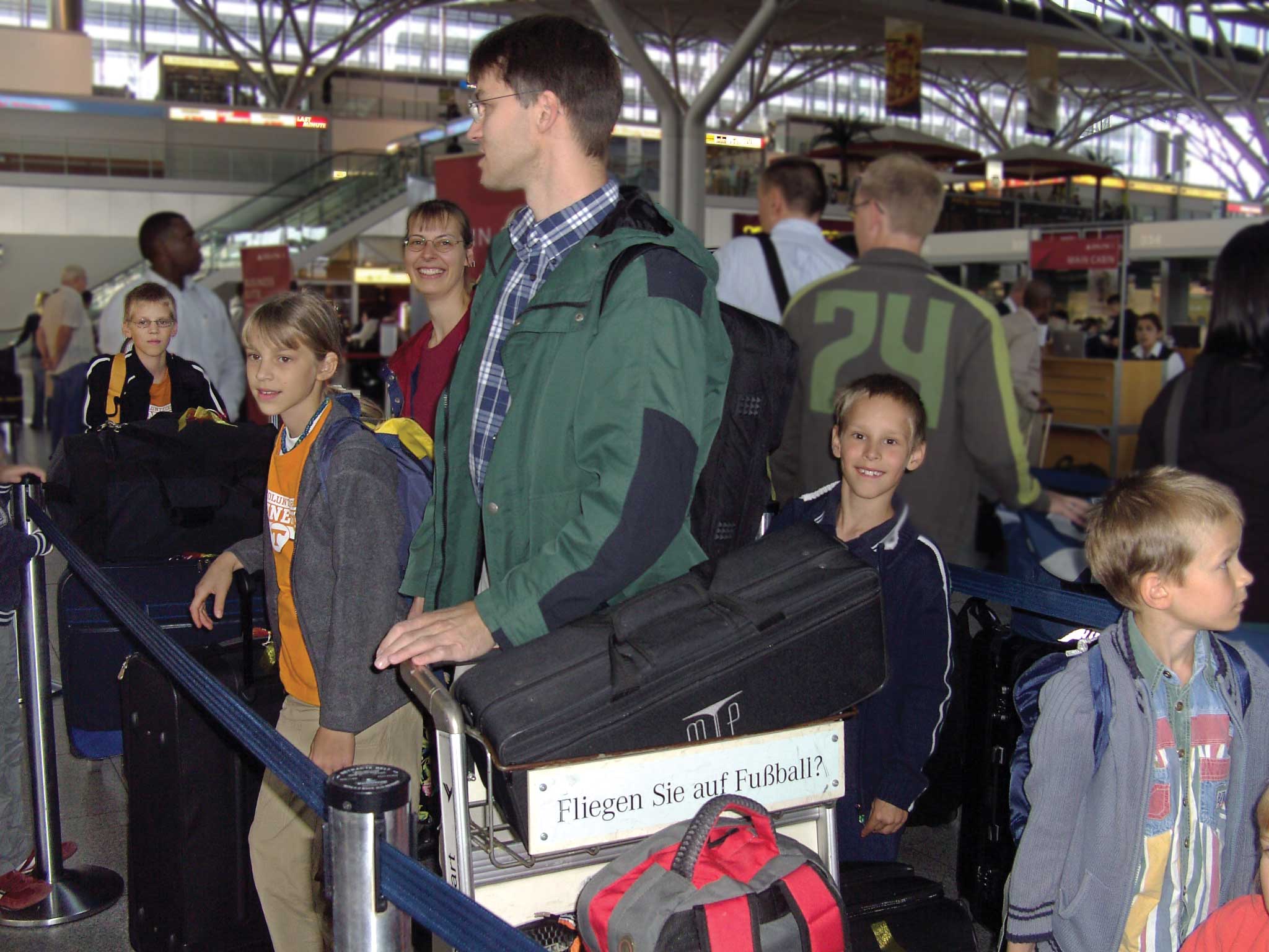 the Romeikes at the airport