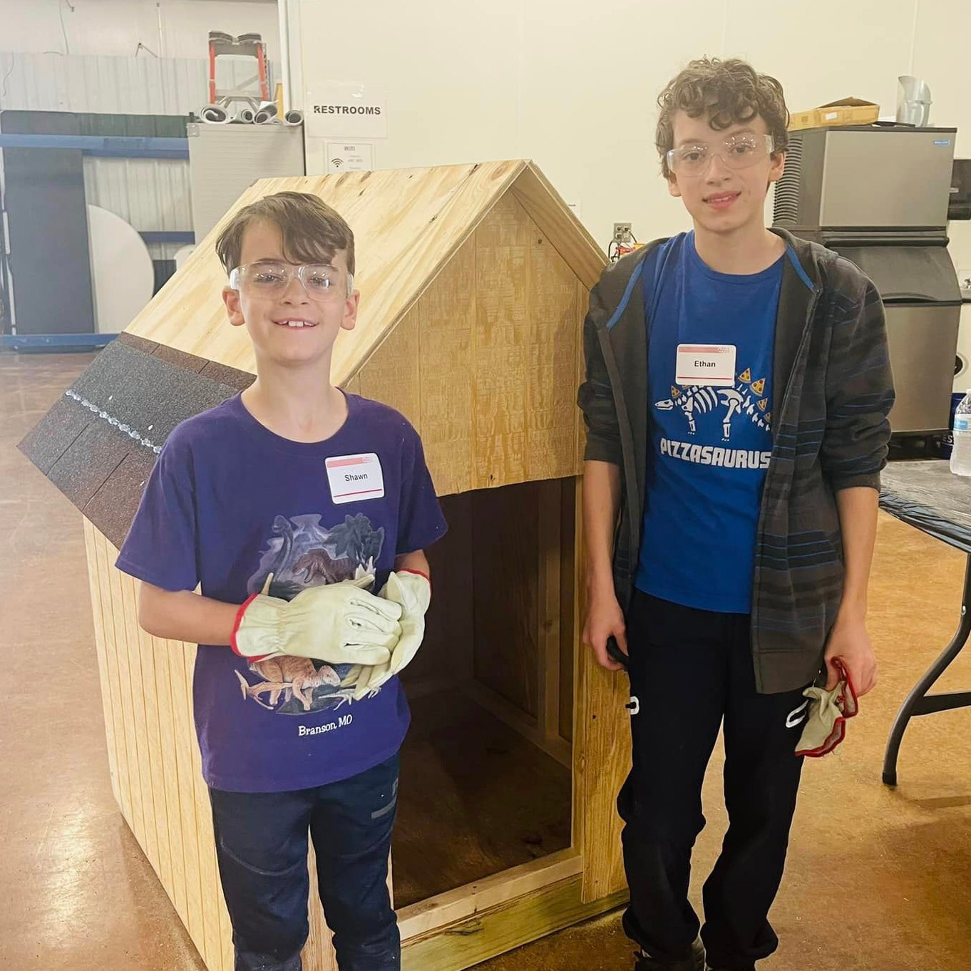 Ethan and Shawn with a handmade doghouse