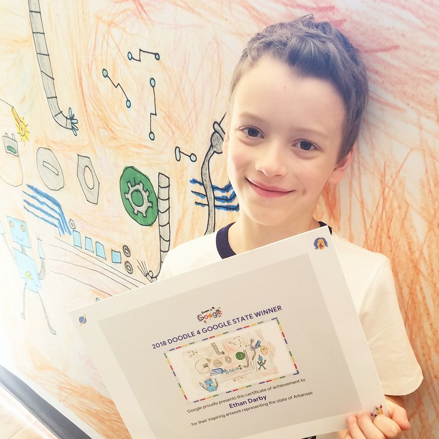 Ethan with his Google Doodle certificate