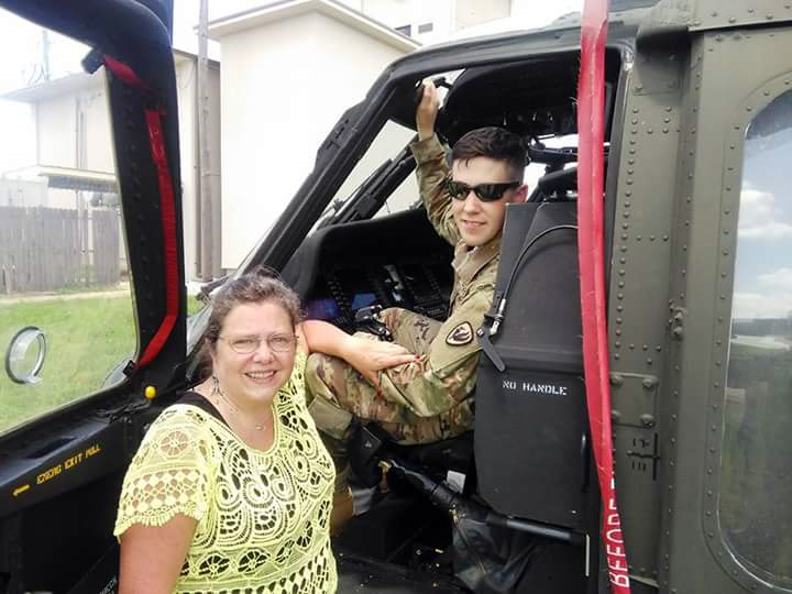 Seth and his mom Jenny with a helicopter